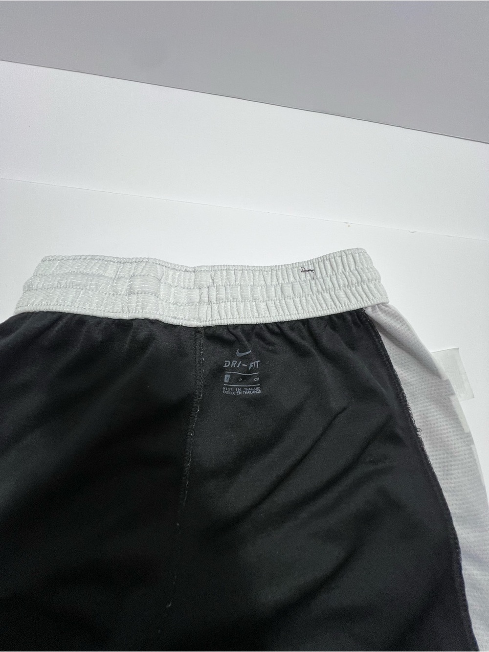 Nike Black Shorts with White Waistband and Side Panels